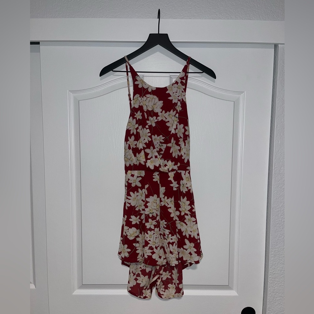 Showpo open back, floral romper - size M